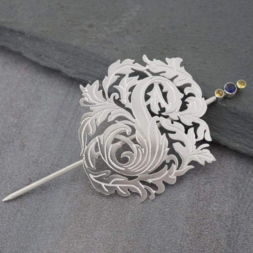 "Signatures S" Engraved Scrollwork Shawl Pin with yellow and blue sapphires